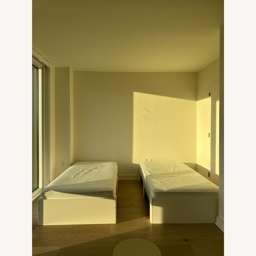 Used Sauder White Wood Twin Bed for sale on AptDeco