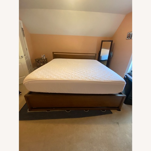 Used Dark Brown Wood California King Bedd for sale on AptDeco