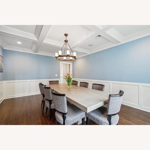 Used Custom Upholstered Wood Dining Chairs for sale on AptDeco