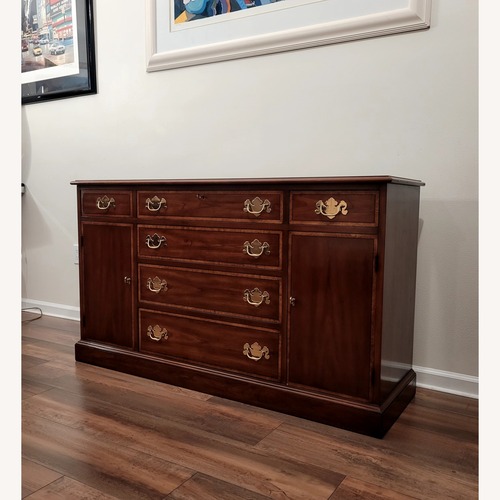 Used Vintage/Antique Dark Brown Wood Sideboard for sale on AptDeco