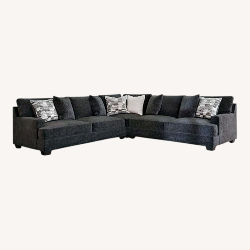 Used Ashley Furniture Dark Gray 3+ Piece Sectional With Ottoman for sale on AptDeco