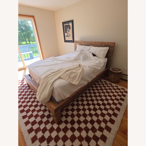 Used West Elm Natural Wood Queen Bed for sale on AptDeco