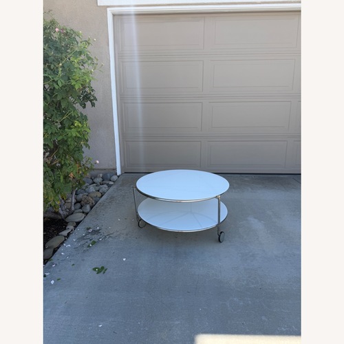 Used IKEA Vintage Strind White Glass Coffee Table space for sale on AptDeco