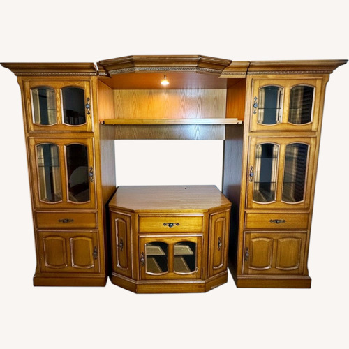 Used Natural Wood Wall Unit Entertainment Center for sale on AptDeco