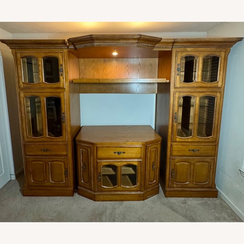 Used Natural Wood Wall Unit Entertainment Center for sale on AptDeco