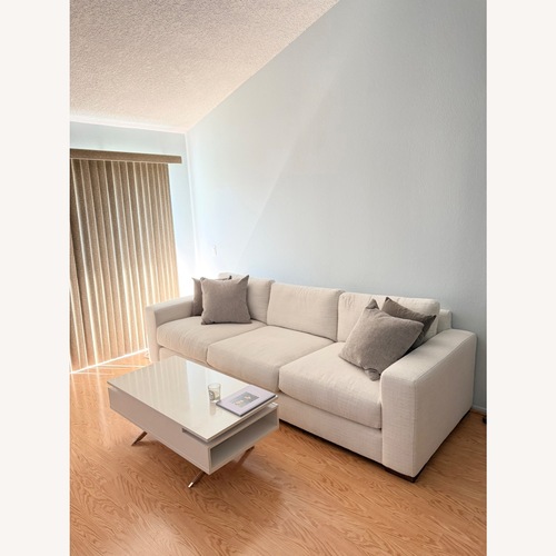 Used White Rectangular Lift Top Coffee Table for sale on AptDeco