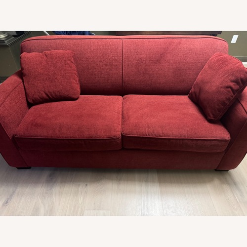 Used Macy’s Modern Concept Crimson Couch for sale on AptDeco