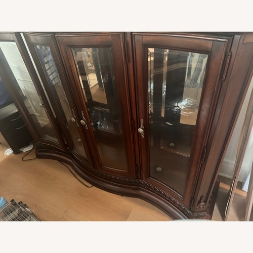 Used Dark Brown Wood Display Cabinet for sale on AptDeco