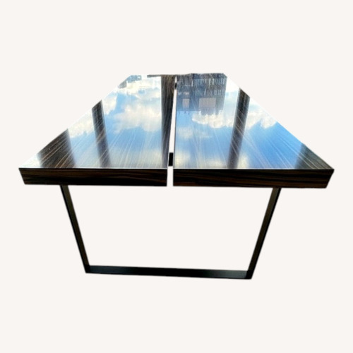 Used Dark Brown Wood Dining Table for sale on AptDeco