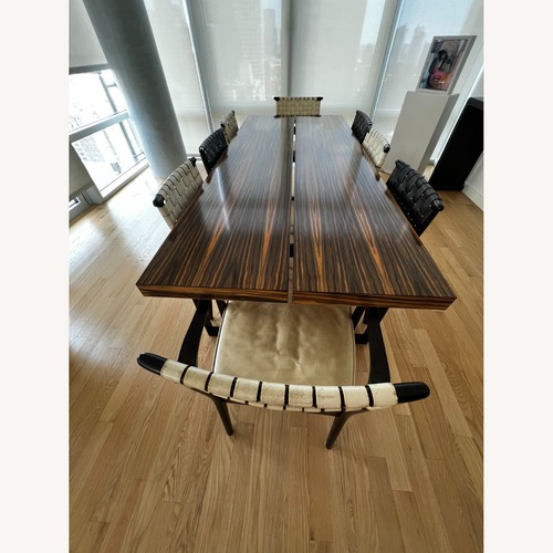 Used Dark Brown Wood Dining Table for sale on AptDeco