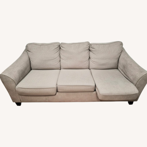 Used Ashley Furniture Sleeper Sofa with Ottoman for sale on AptDeco