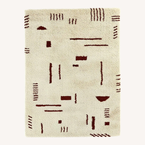 Used Morin Geometric Shag Area Area Rug 6'7" x 9' for sale on AptDeco