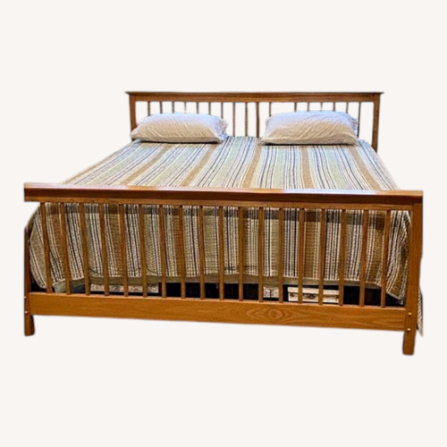 Used Natural Wood King Bed for sale on AptDeco