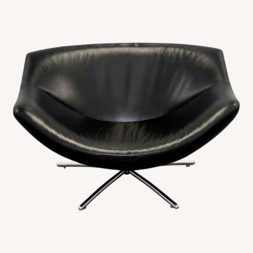 Used Heals Gerard Van Den Berg Black Leather Gigi Swivel Armchair for sale on AptDeco