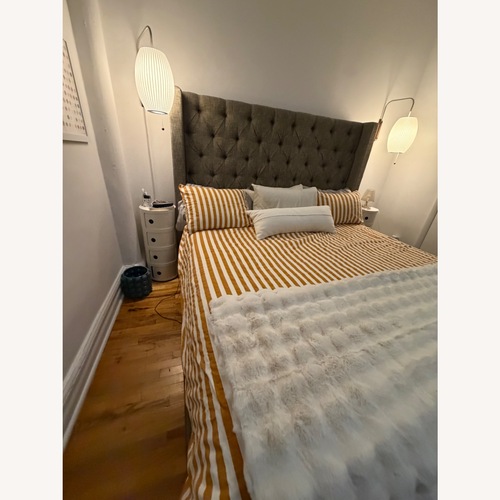 Used Ashley Furniture Light Brown Fabric King Bed for sale on AptDeco
