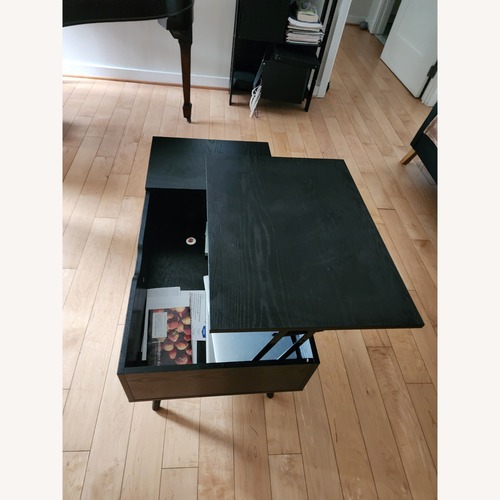 Used Black Wood Coffee Table for sale on AptDeco