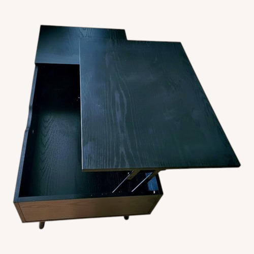 Used Black Wood Coffee Table for sale on AptDeco