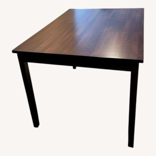 Used Dark Brown Dining Table for sale on AptDeco