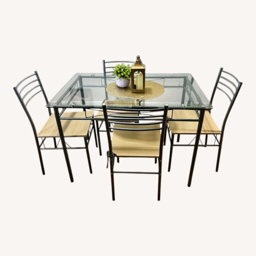 Used Natural Glass Dining Set for sale on AptDeco