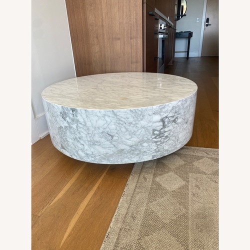 Used Marble Plinth Round Coffee Table for sale on AptDeco