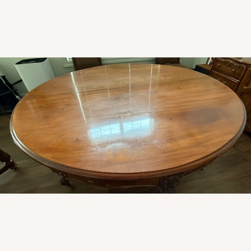 Used Vintage/Antique Dark Brown Dining Table for sale on AptDeco
