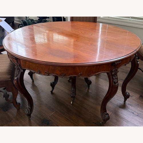 Used Vintage/Antique Dark Brown Dining Table for sale on AptDeco