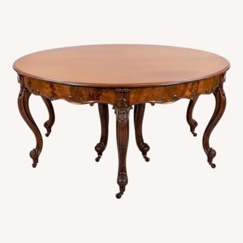 Used Vintage/Antique Dark Brown Dining Table for sale on AptDeco