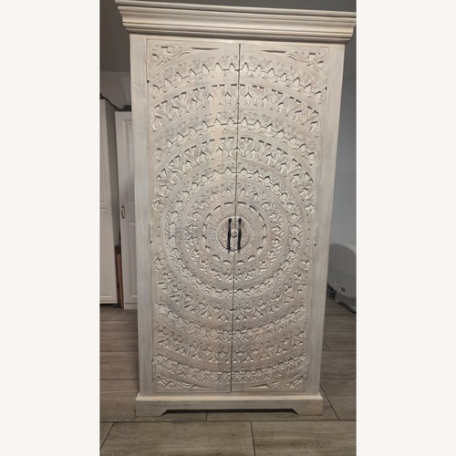 Used Jaipur Inspired Hand Carved Bar Cabinet for sale on AptDeco