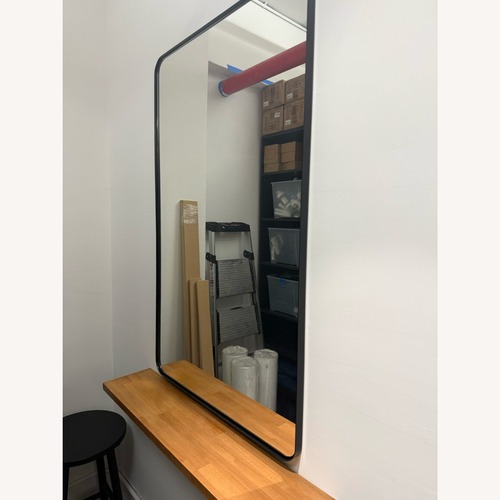 Used Black Glass Wall Mirror for sale on AptDeco
