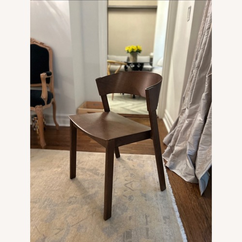 Used Dark Brown Wood Dining Chair for sale on AptDeco