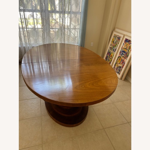 Used Pineapple Leaf Shaped Leg Dining Table for sale on AptDeco