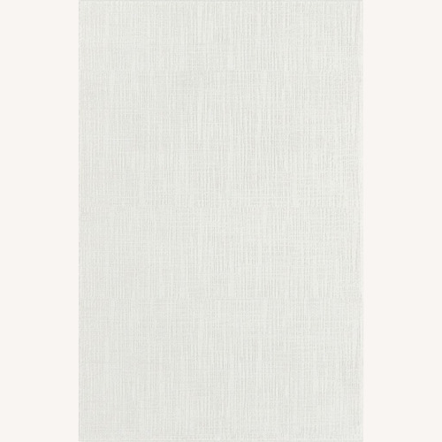 Used Cream Area Rug (6x9) for sale on AptDeco
