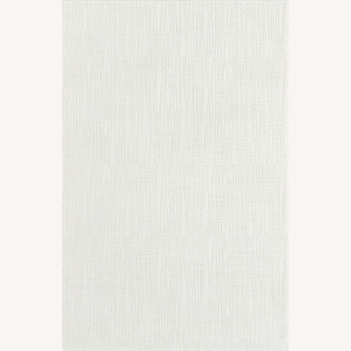 Used White Area Rug 8' x 10' for sale on AptDeco