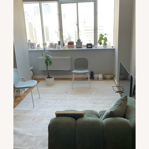 Used White Area Rug 8' x 10' for sale on AptDeco