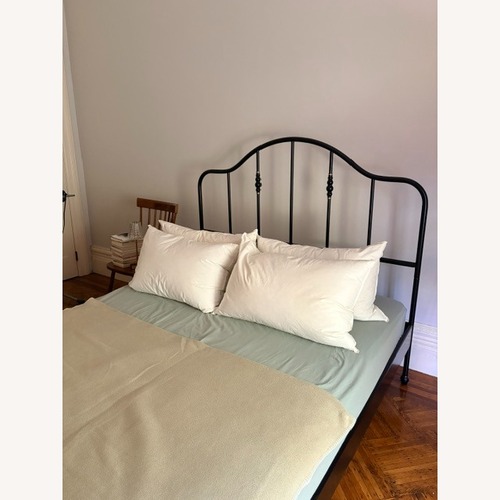 Used IKEA SAGSTUA Black Metal Queen Bed Frame (Wooden Slats) for sale on AptDeco
