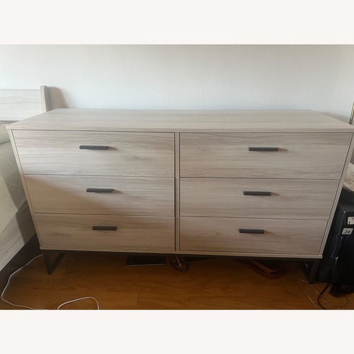 Used Ashley Furniture Light Brown Wood Dresser for sale on AptDeco