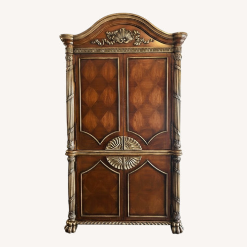 Used Dark Brown Wood Armoire for sale on AptDeco