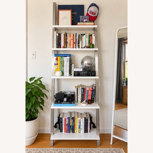 Used White & Brushed Silver Ladder Bookshelf for sale on AptDeco