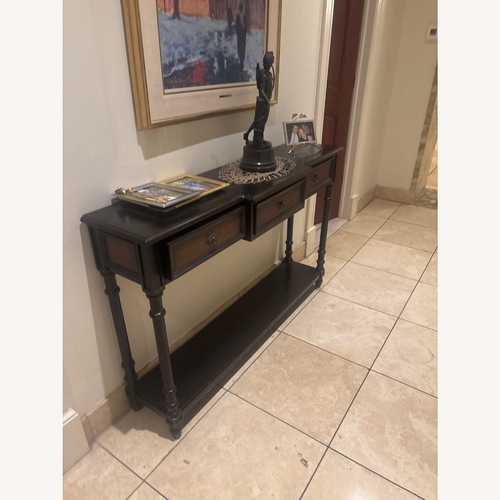 Used Vintage/Antique Dark Brown Wood Décor for sale on AptDeco