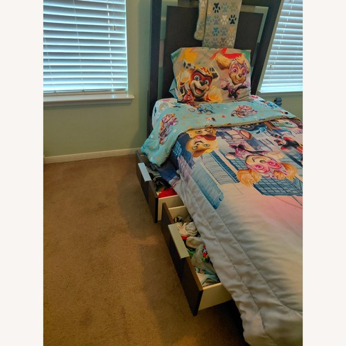 Used Dark Brown Wood Twin Bed for sale on AptDeco