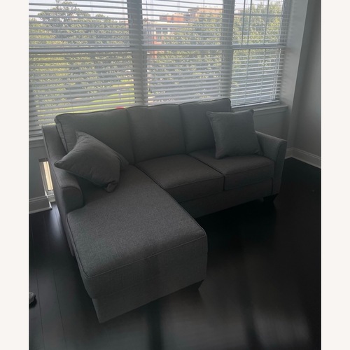 Used Rooms To Go Light Gray 2 Piece Sectional for sale on AptDeco