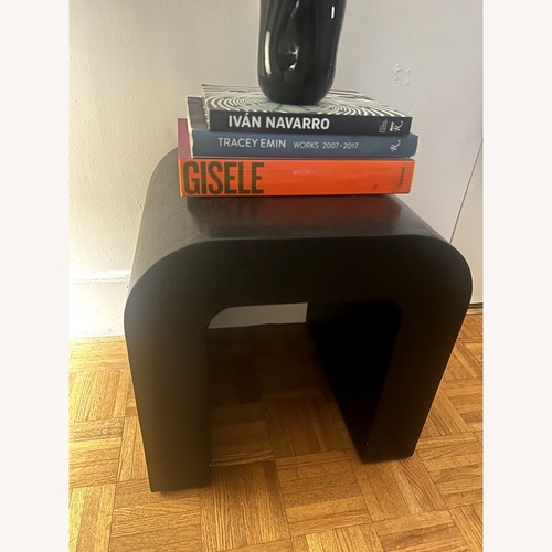 Used CB2 Horseshoe Black Resin Side Table for sale on AptDeco