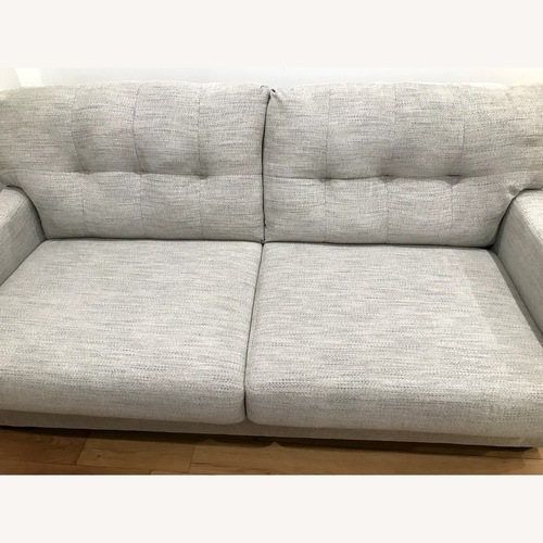 Used Ashley Furniture Light Gray Fabric 2 Seater Sofa for sale on AptDeco