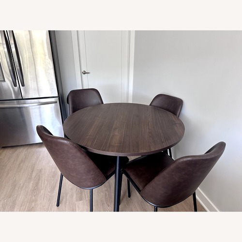 Used Loft 5 Piece Brown Faux Leather Round Dining Set for sale on AptDeco