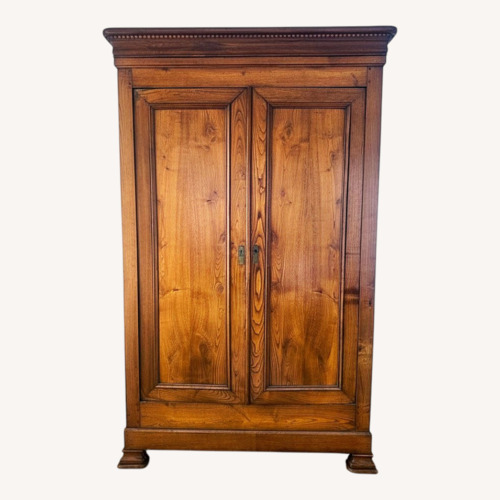 Used French Heritage Light Brown Wood Armoire for sale on AptDeco