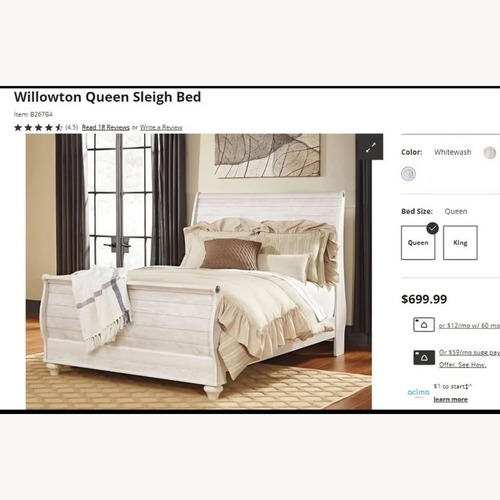 Used Ashley Furniture Sleigh Style White Wood Queen Bed for sale on AptDeco