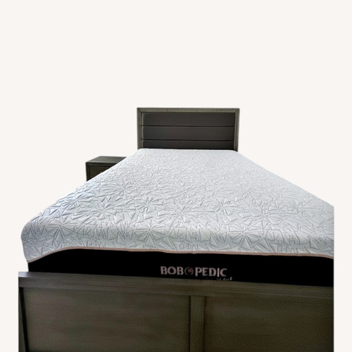 Used Queen Gray Upholstered Storage Panel Bed  for sale on AptDeco