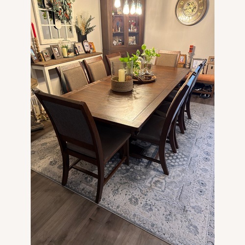 Used Ashley Dining Table with 8 Chairs for sale on AptDeco