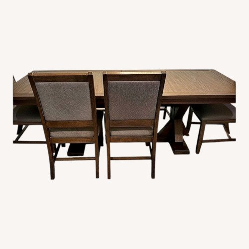 Used Ashley Dining Table with 8 Chairs for sale on AptDeco