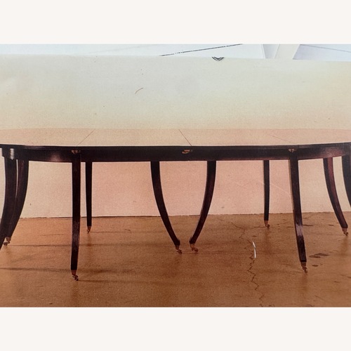 Used Vintage/Antique Dark Brown Dining Table for sale on AptDeco